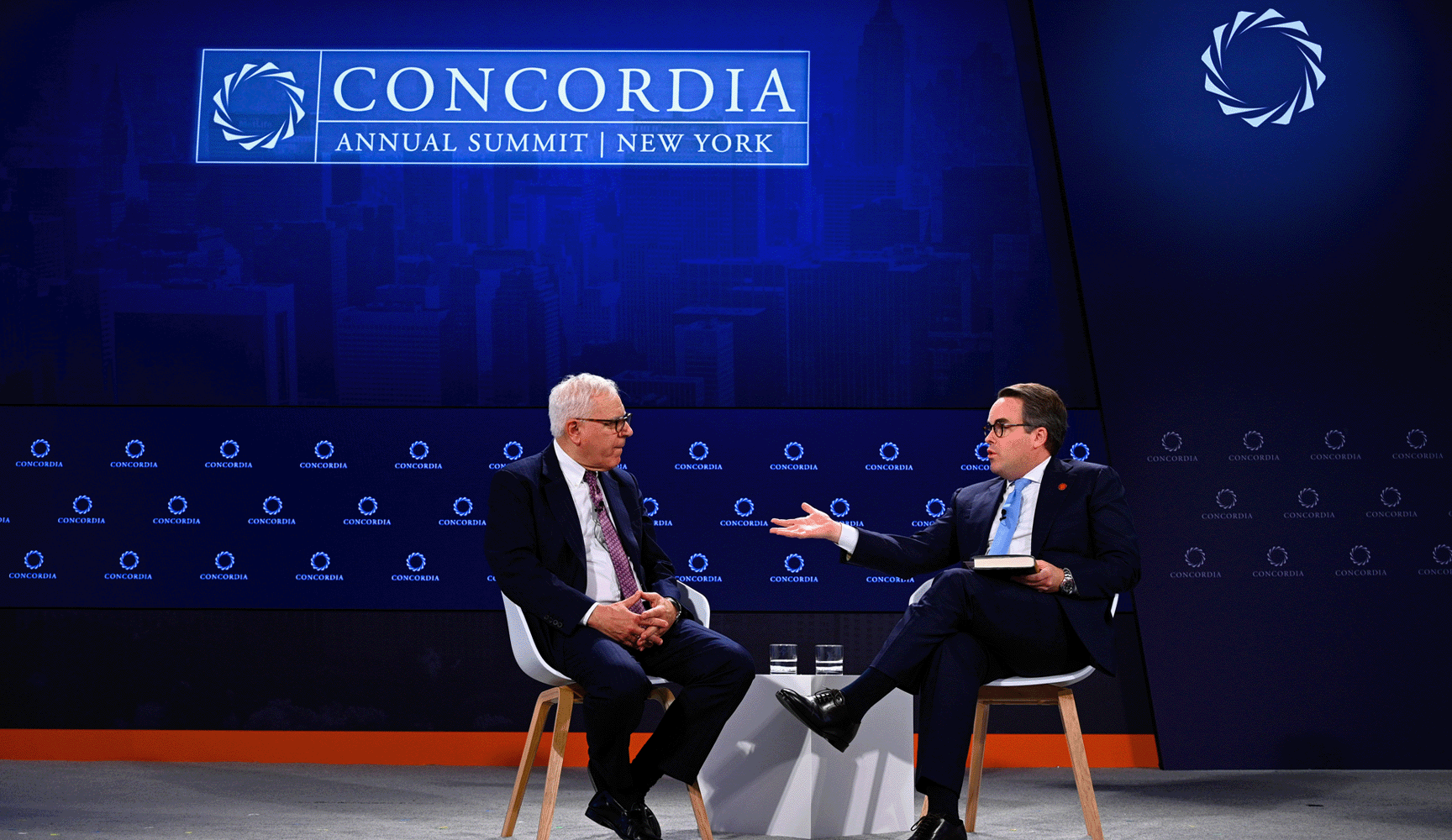 Two men on stage at the Concordia event
